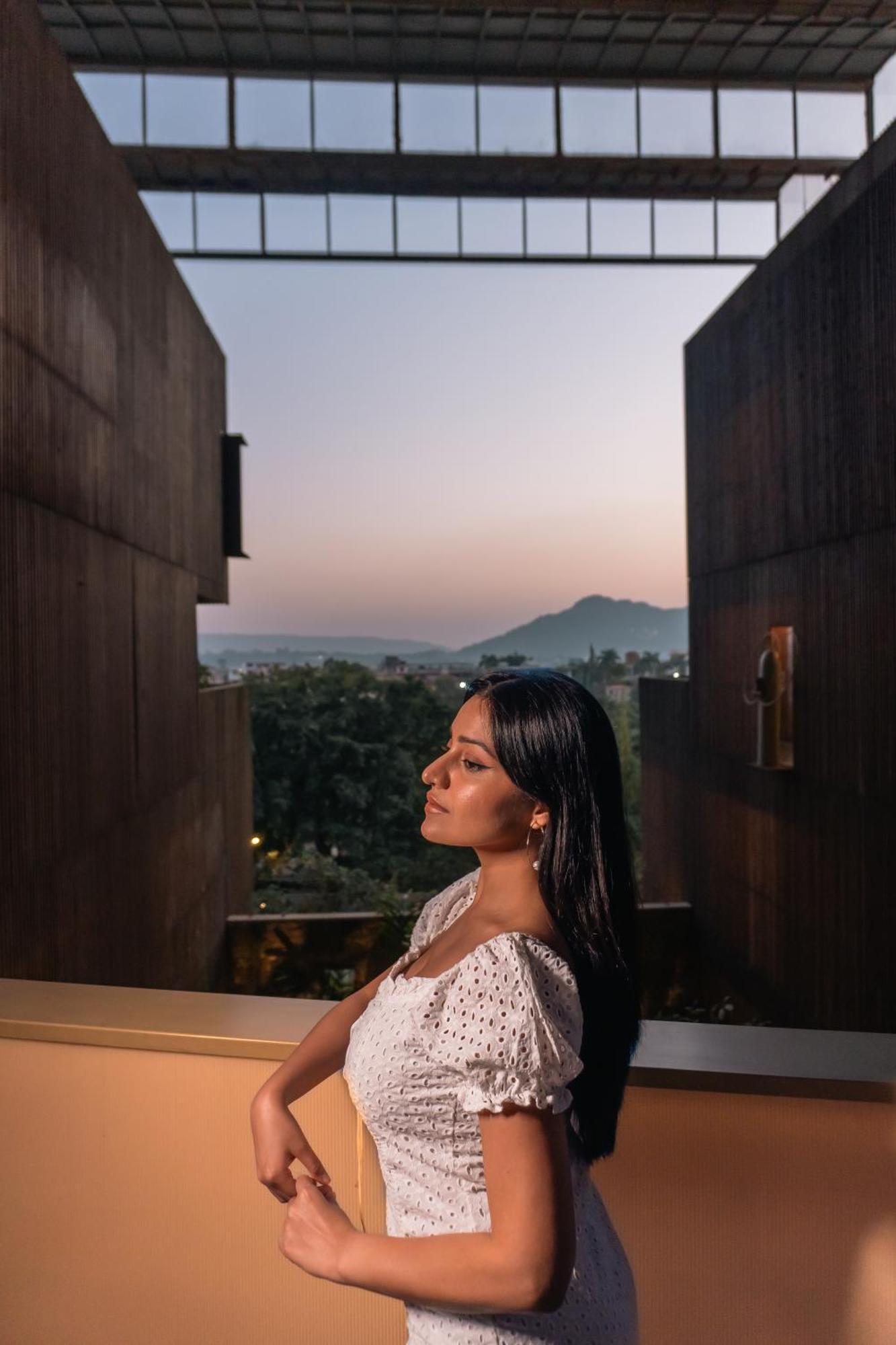 Radisson Resort And Spa Lonavala Exterior foto A woman in contemplation